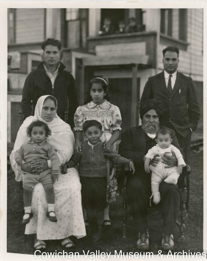 [Rajindi and his family posing for a family photo]