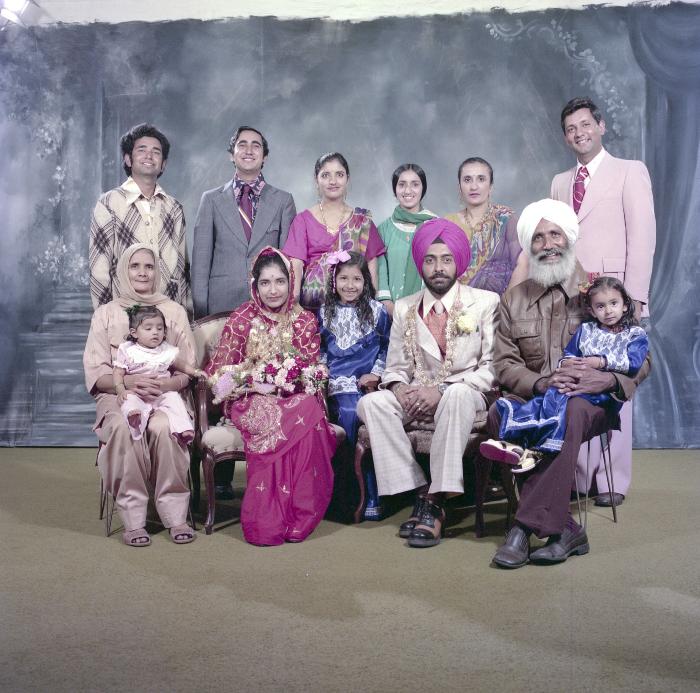 [Group portrait of Sinder Sandhu, Jaswant Gill and their family]
