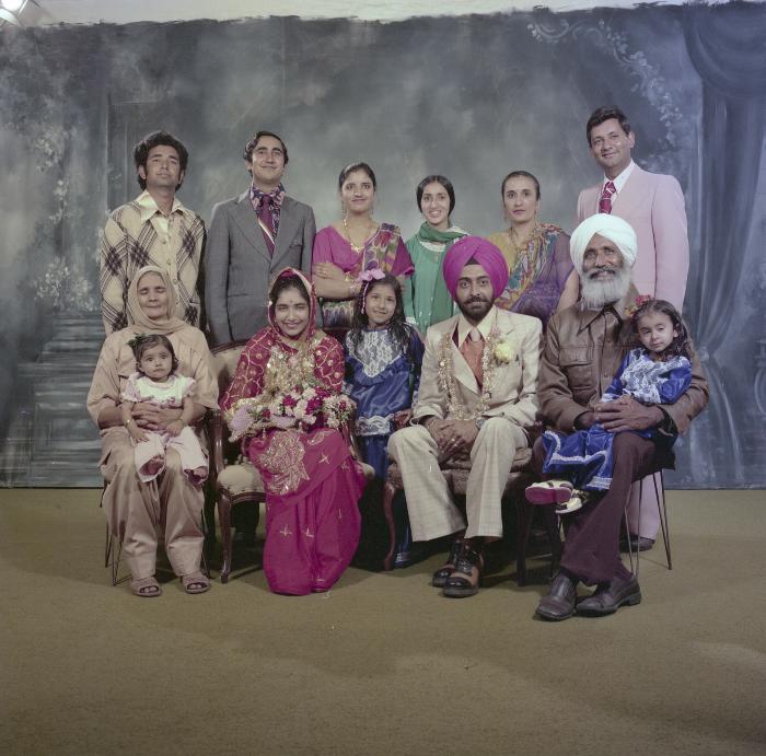 [Group portrait of Sinder Sandhu, Jaswant Gill and their family]