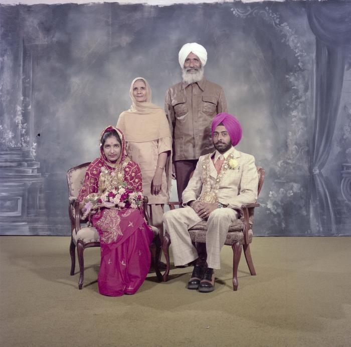 [Group portrait of Sinder Sandhu, Jaswant Gill and two unidentified wedding guests]