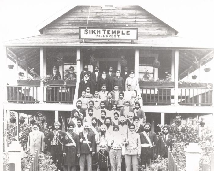 [Group photo of men in military dress in front of Hillcrest Temple, with names listed on back]