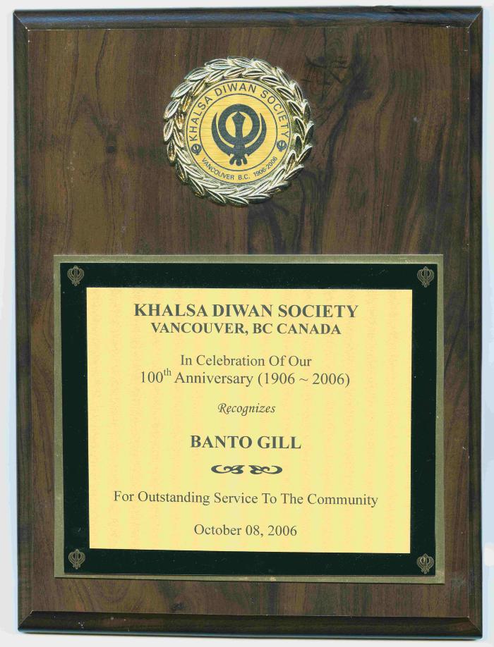 [Wooden plaque awarded to Banto Gill by the Vancouver Khalsa Diwan Society]