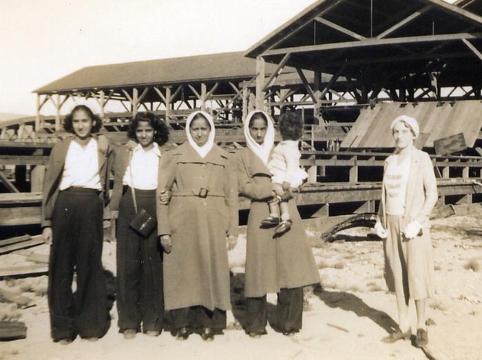 [Group photo of Siddoo family and other women at the Kapoor Sawmill in Burnaby, BC]