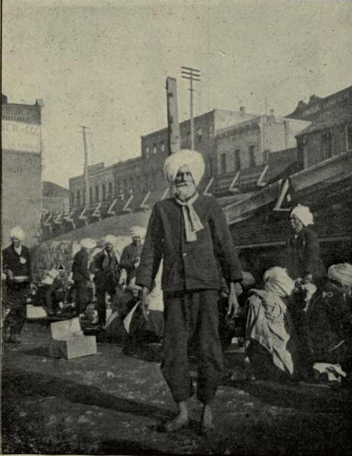 [Photo of Indian immigrants near the Canadian Pacific Railway wharf in Victoria, BC]