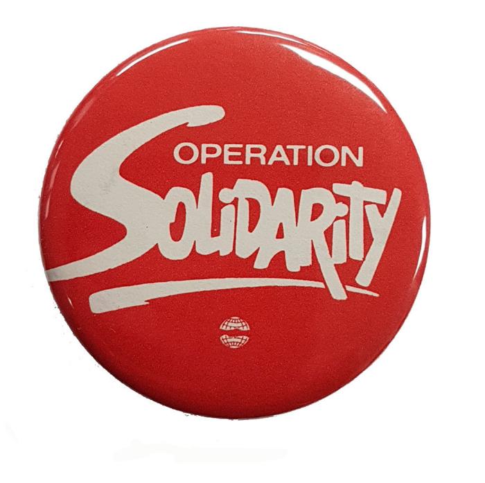[Photo of Operation Solidarity button]