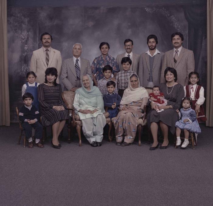 [Group portrait of Onkar Brar and a group of unidentified family members]