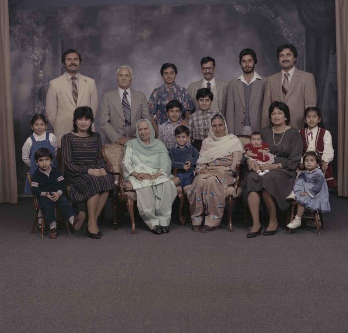 [Group portrait of Onkar Brar and a group of unidentified family members]