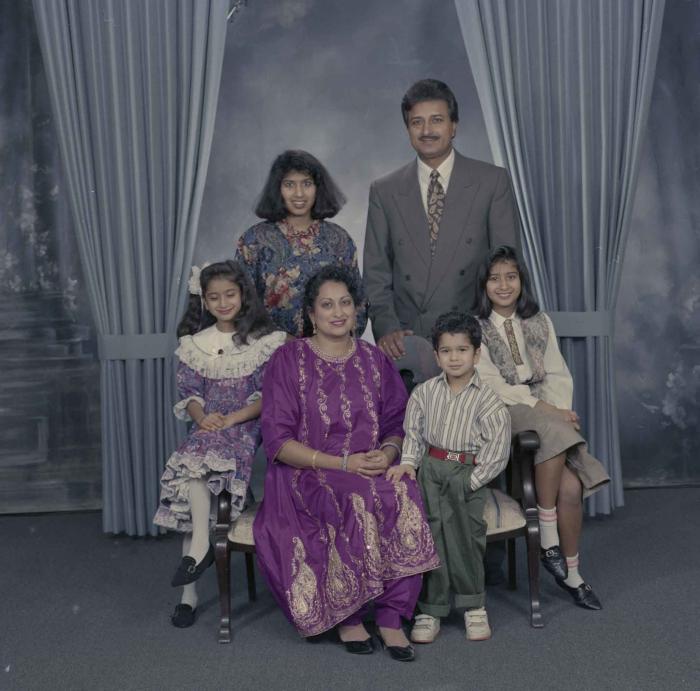 [Group portrait of Onkar Brar and unidentified family members]