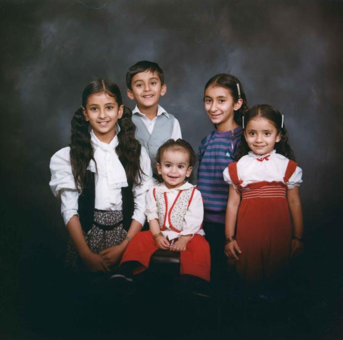 [Group portrait of five unidentified children]