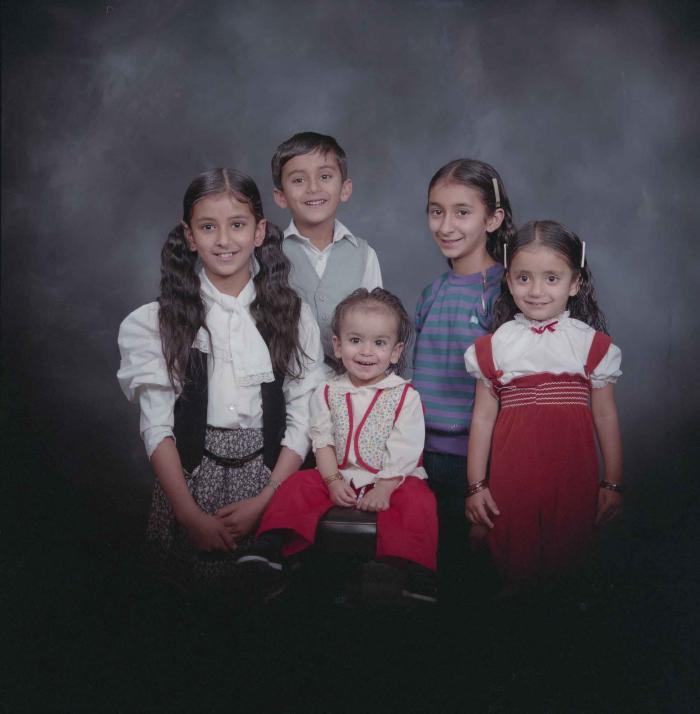 [Group portrait of five unidentified children]