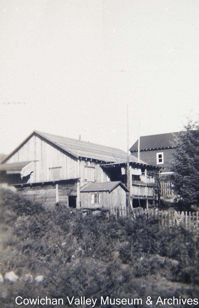 [Wood buildings on a hill]