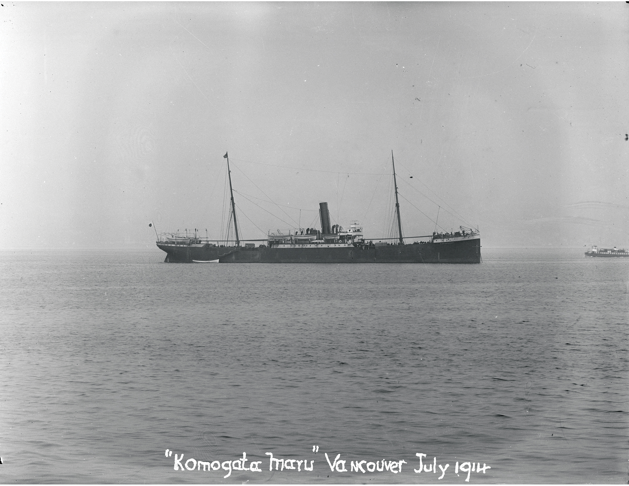 Scene in 
Vancouver Harbor, July 21, 1914 H.M.S. Rainbow, called to aid in deporting the South Asians on board the 
Komagata Maru
