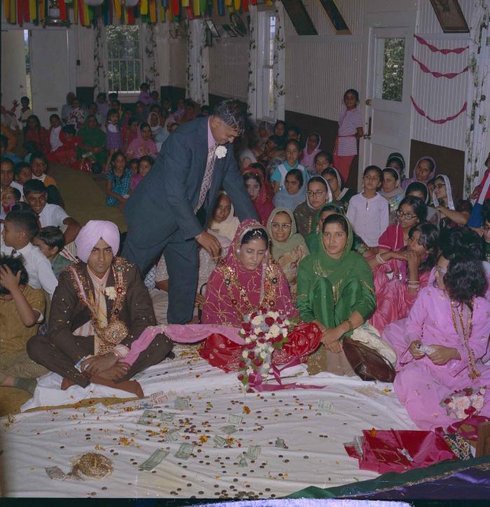 [Photo of Mohinder Singh Gill and Malkit Brar]