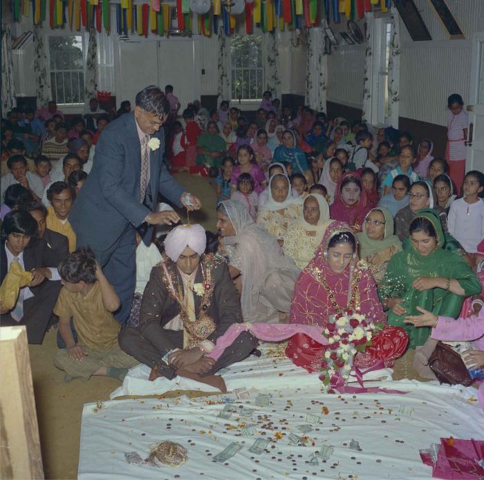 [Photo of Mohinder Singh Gill and Malkit Brar]