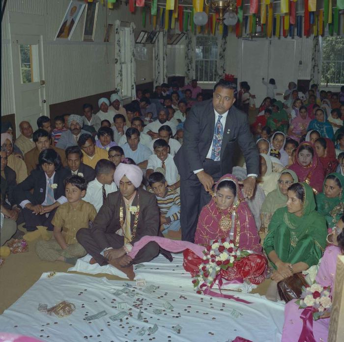 [Photo of Mohinder Singh Gill and Malkit Brar]