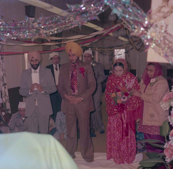 [Photo of Nirmal Grewal and Surbjit Saran]