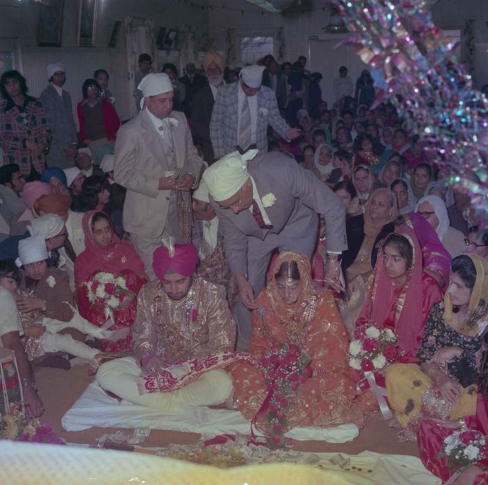 [Photo of Balbinder Rakhra and Balwant Neger]