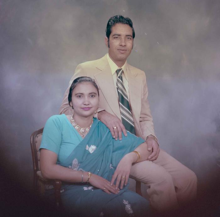 [Photo of Hardev Sandhu with an unidentified woman]