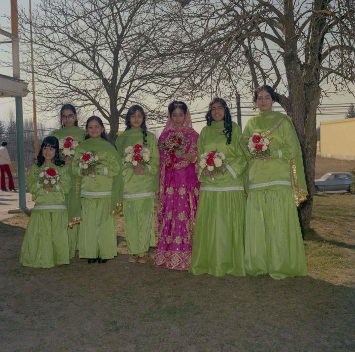 [Photo of Ossie Daray with bridesmaids]