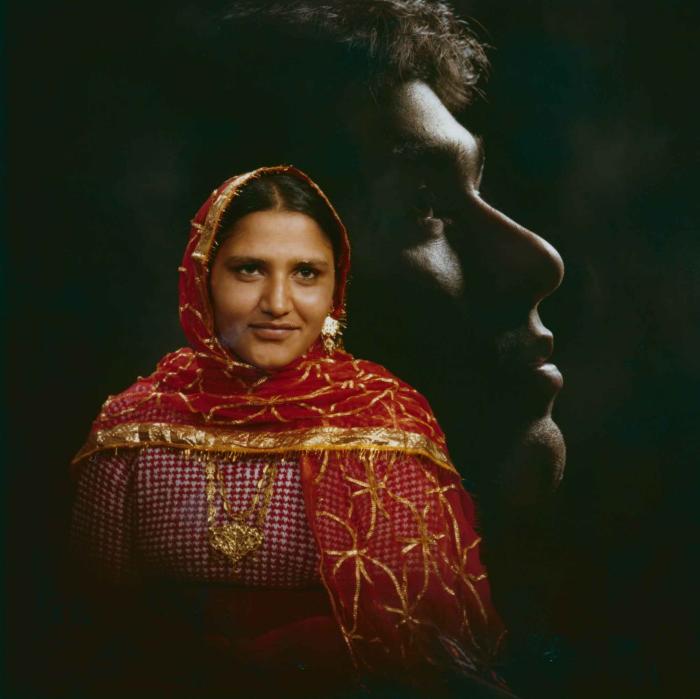 [Photo of Balbir Sidhu with an unidentified woman]