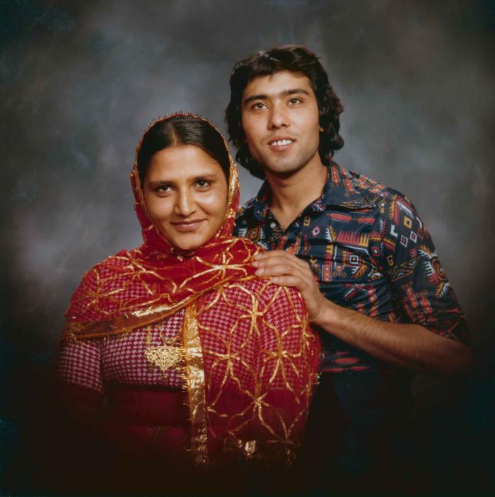 [Photo of Balbir Sidhu with an unidentified woman]