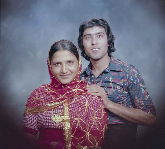 [Photo of Balbir Sidhu with an unidentified woman]