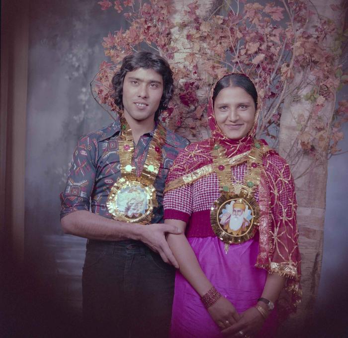 [Photo of Balbir Sidhu with an unidentified woman]
