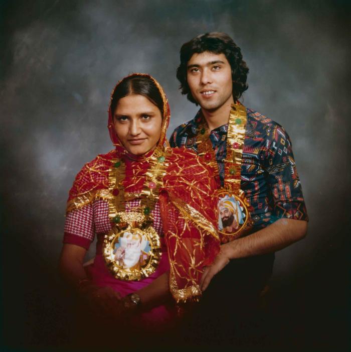 [Photo of Balbir Sidhu with an unidentified woman]