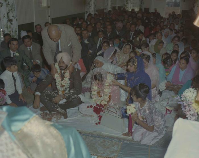 [Photo of Randawa Singh Harder with an unidentified bride]