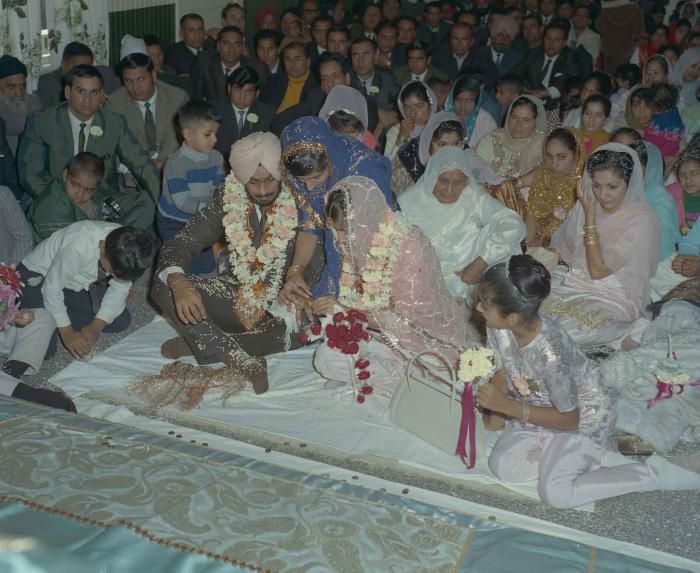 [Photo of Randawa Singh Harder with an unidentified bride]