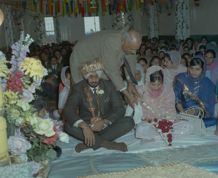 [Photo of Randawa Singh Harder with an unidentified bride]