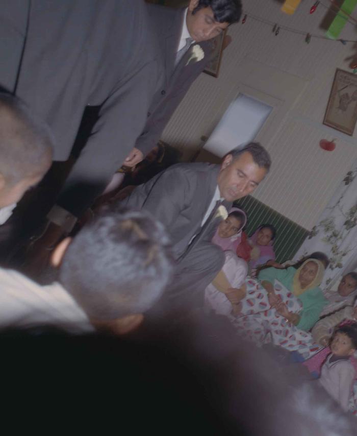 [Photo of unidentified men]