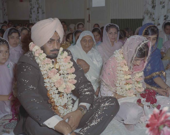[Photo of Randawa Singh Harder with an unidentified bride]