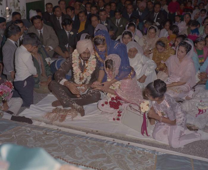 [Photo of Randawa Singh Harder with an unidentified bride]