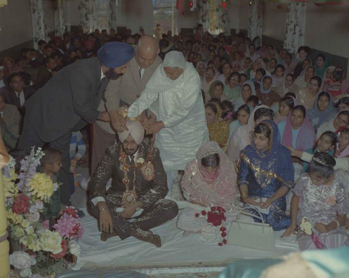 [Photo of Randawa Singh Harder with an unidentified bride]