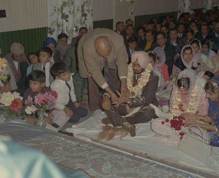 [Photo of Randawa Singh Harder with an unidentified bride]