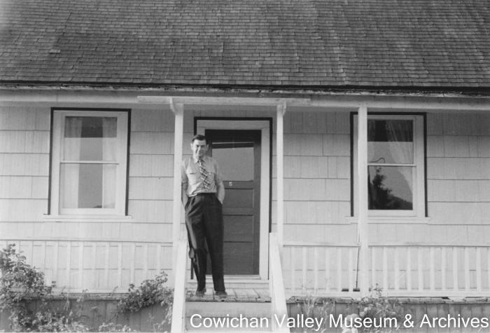 [Henry McHemer company controller in front of Mayo Lumber Co. office]
