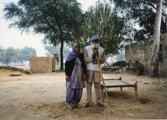 [Photo of Surjit Kaur in her village house in India]