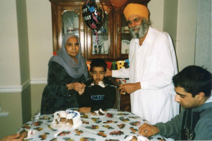 [Photo of Surjit Kaur celebrating her grandson's 3rd birthday]