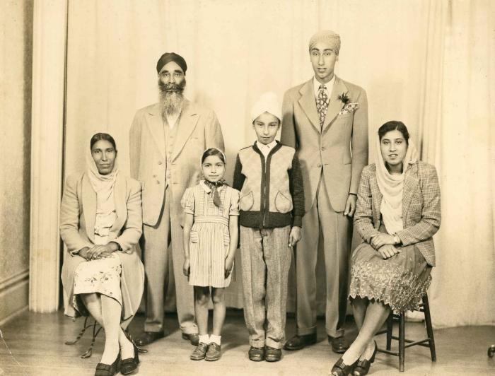 [Photo of Mit Singh Pandori and family]