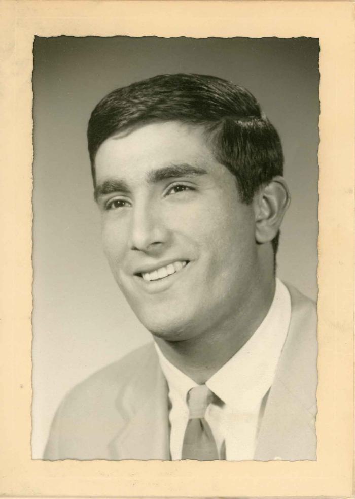 [Photo of an unidentified man]