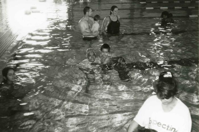 [Photo of Surjit Kaur in the swimming pool with her granson]