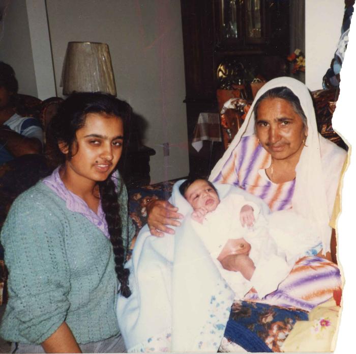 [Photo of Surjit Kaur with her daughter and grandson]