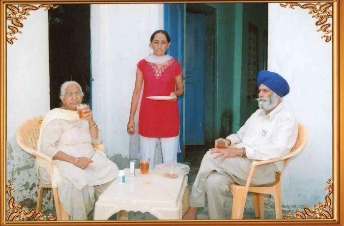 [Photo of Surjit Kaur with her husband]