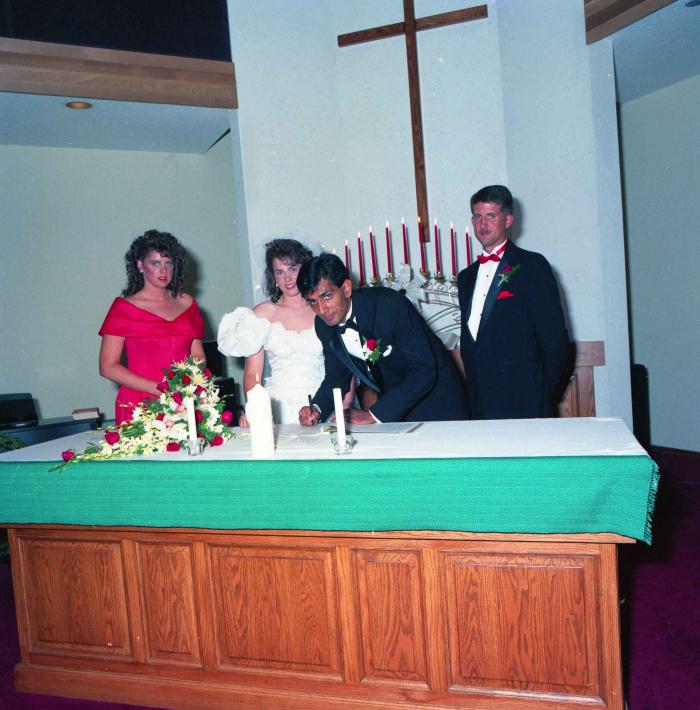 [Group photo of Mal Gill and Leanne Neitch in the church]