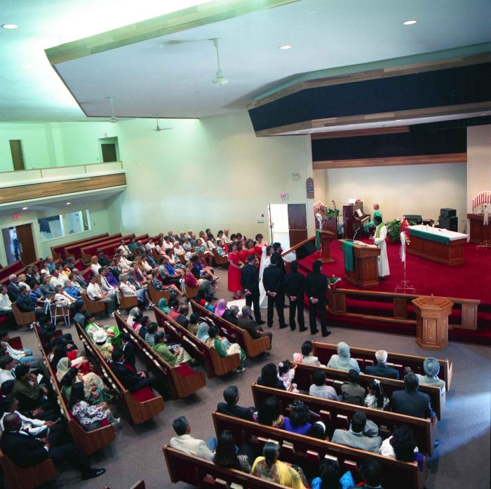 [Wedding photo of Mal Gill and Leanne Neitch in the church]