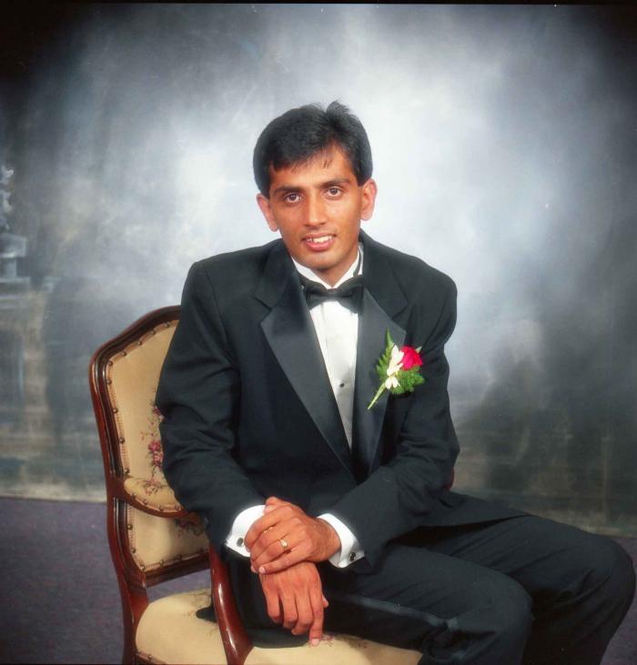 [Portrait photo of Mal Gill]