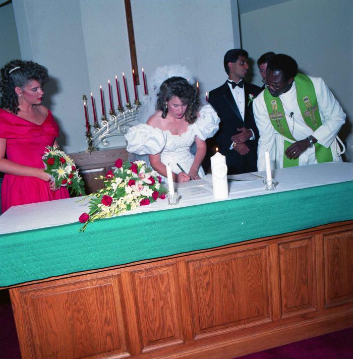 [Group photo of Mal Gill and Leanne Neitch in the church]