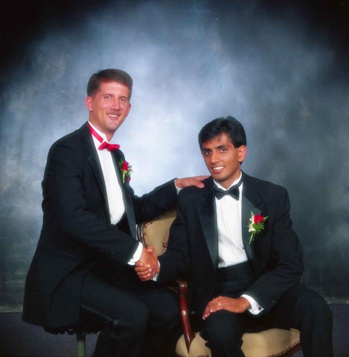 [Photo of Mal Gill and a groomsmen]