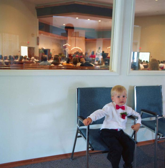 [Photo of a white boy]